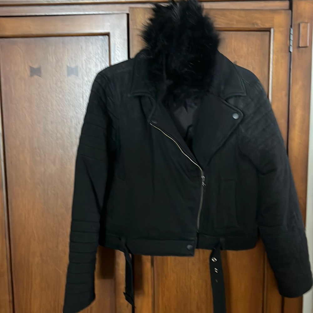 Distressed black denim jacket with detachable faux fur collar by Cloth& Stone